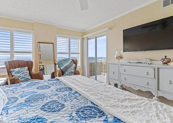 Beachfront 2-Bedroom Condo With Stunning Ocean Views Perfect For Family Getaways