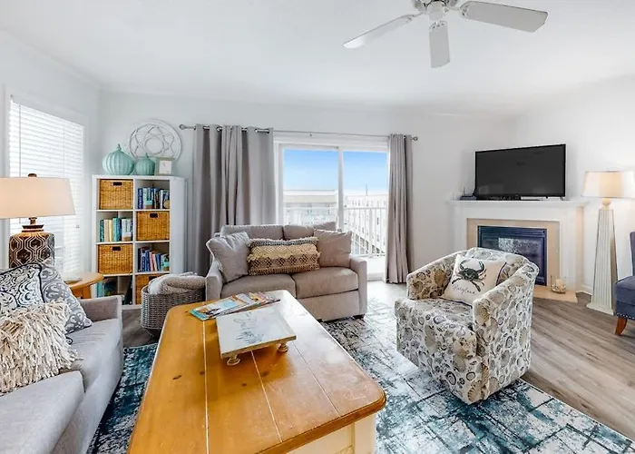 Renovated Corner Condo With Ocean View Balcony Fireplace & Shared Pool