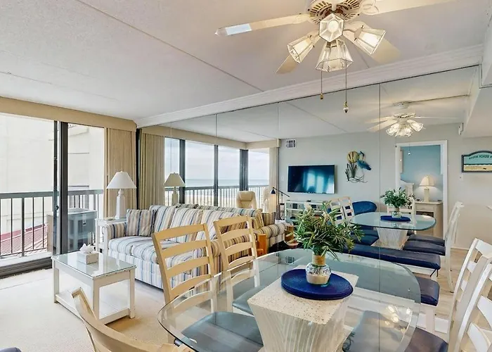 Sunny Coastal Condo With Beach Views Balcony Pools Gym Sauna & Ac
