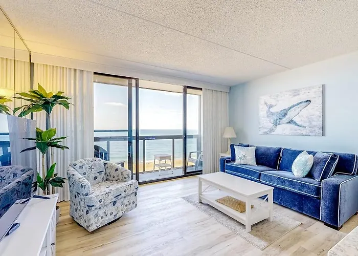 Captivating Beachfront Condo With Balcony Views Pools Gym & Tennis Court