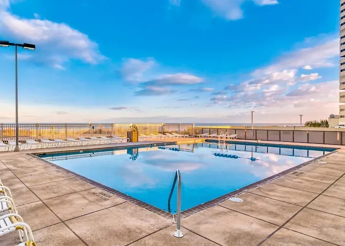 Beachy Condo With Small Balcony Ac Pools Gym Game Room & Sauna